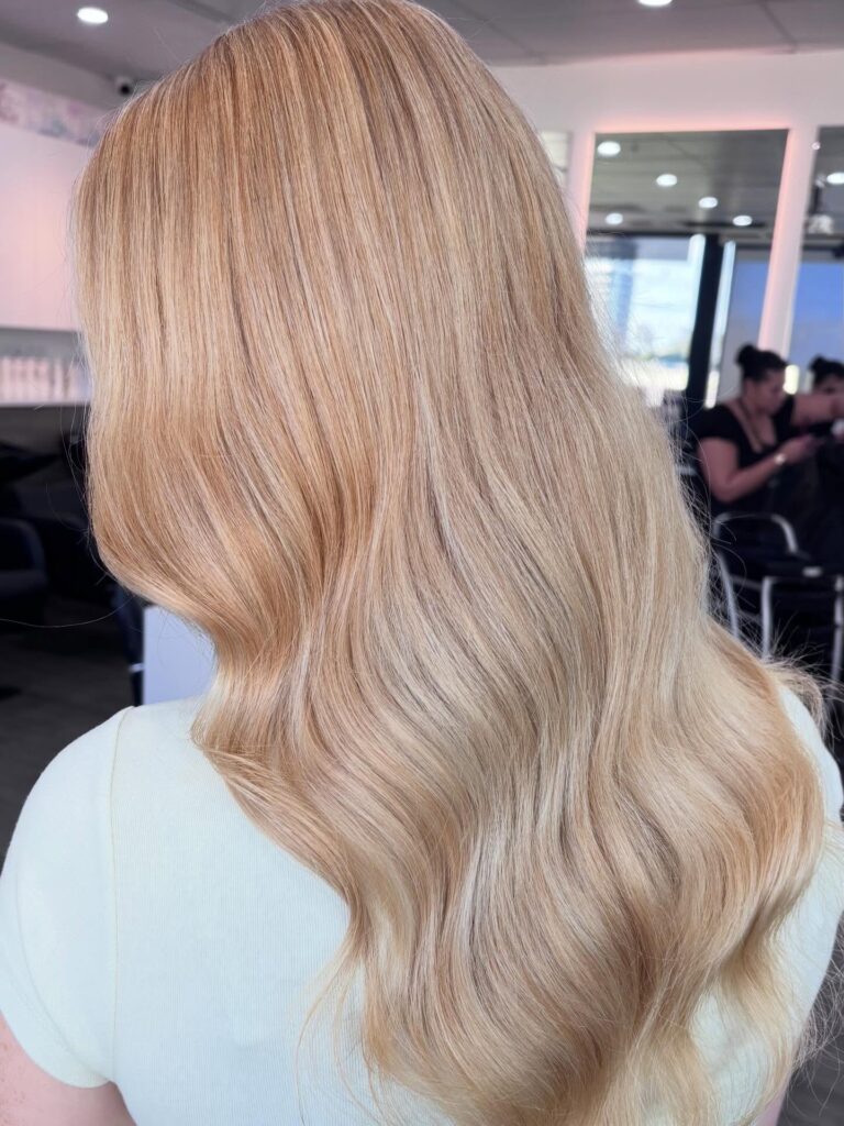 Creamy blonde hair at Epic Hair Designs by stylist Eva