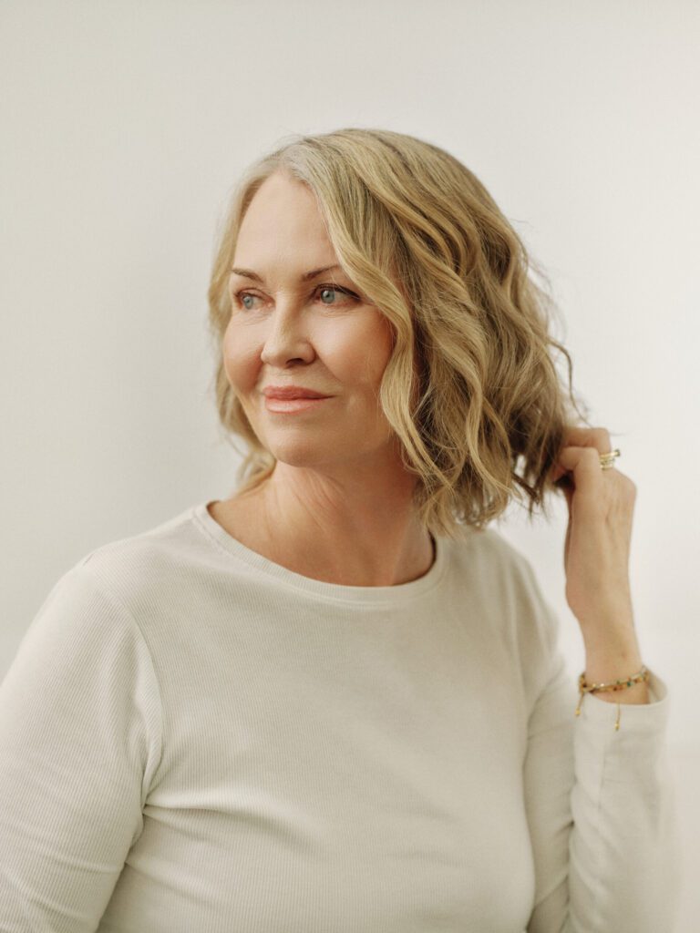 Epic client with a softly waved blonde bob