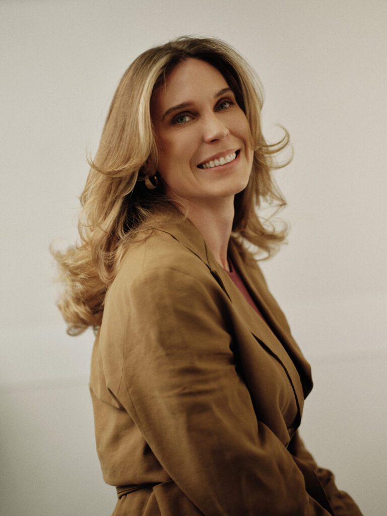 epic-hair-layered-blonde-hair-smiling-portrait
