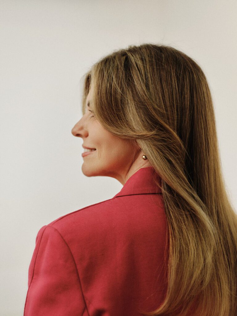 Epic client with long caramel highlighted layers